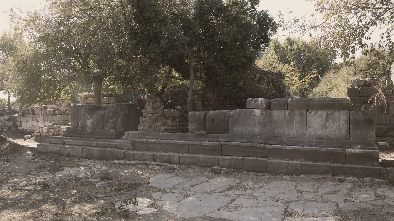 Bases of honorific monuments in the harbour agora — the statues that stood on them are gone
